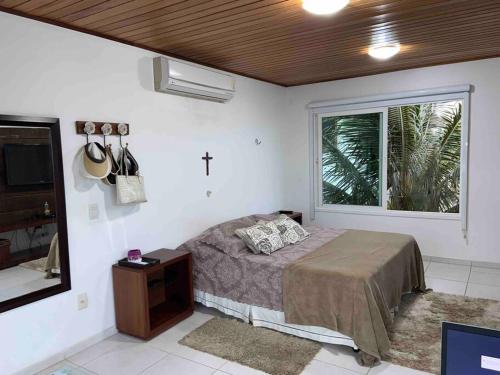 Postel nebo postele na pokoji v ubytování Paraíso de Gravatá