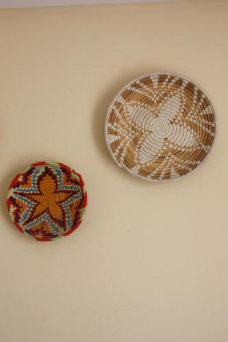 two donuts are sitting on a white wall at Joy surf camp in Agadir