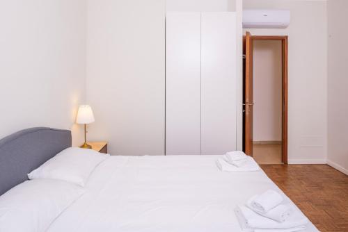 Katil atau katil-katil dalam bilik di Residenza Gigli