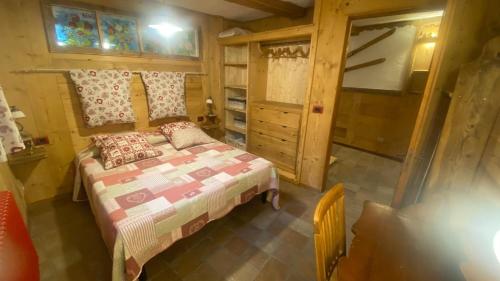 Postel nebo postele na pokoji v ubytování La Tana