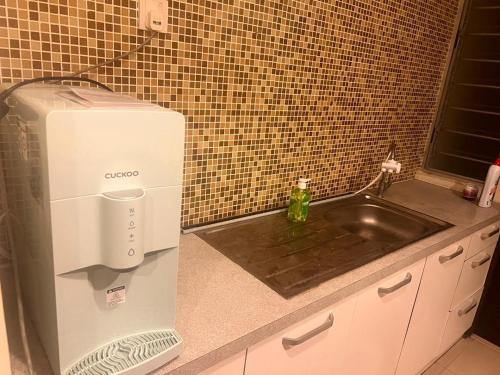 Køkken eller tekøkken på A sweet home for your trip