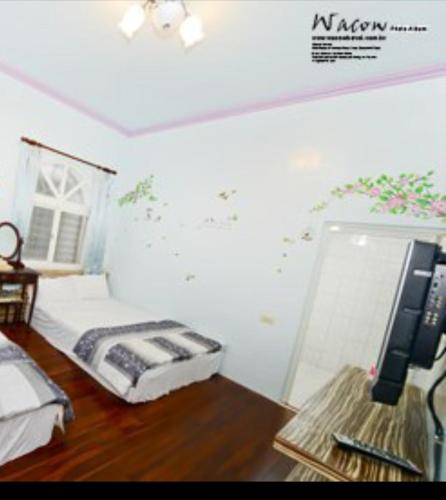 Una cama o camas en una habitación de 豐富民宿