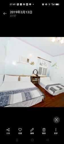 Una cama o camas en una habitación de 豐富民宿