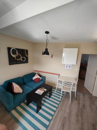 Posezení v ubytování Résidence Leclerc - Appartements d'hôtes - Secteur thermal