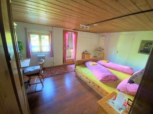 Giường trong phòng chung tại Bergpension Battagliahütte