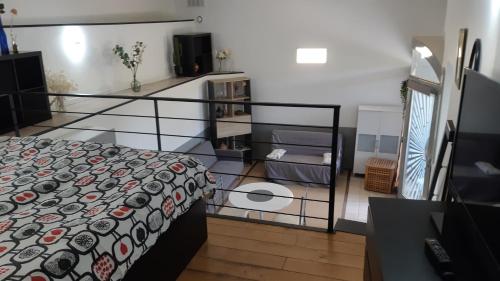 Posteľ alebo postele v izbe v ubytovaní Petit loft face rivière