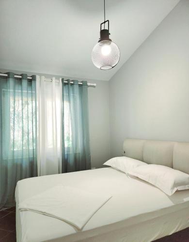 Katil atau katil-katil dalam bilik di PineTrees Gem Villa Golem