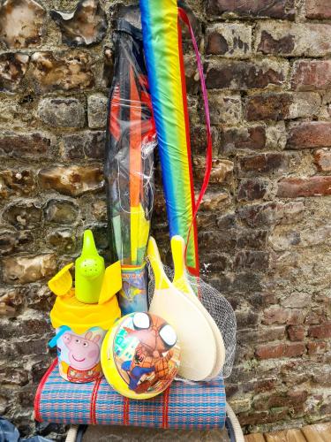 a table with a bunch of toys on it at Appartement, terrasse & barbecue in Dieppe
