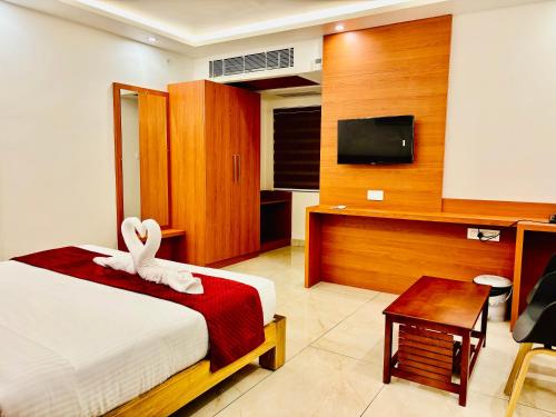 Μια τηλεόραση ή/και κέντρο ψυχαγωγίας στο Hotel Starfinch Inn