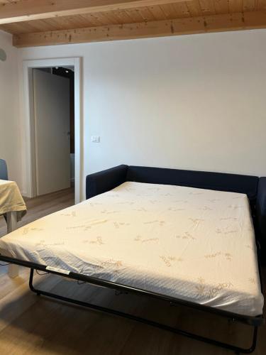 a mattress on a bed frame in a room at Larocca Tourist Home 6 Valbrenta in Carpane