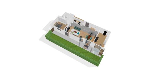 rendu d'une maison avec une pelouse verte dans l'établissement T3 Calme - Idéal Famille & Pros - Parking - Jardin - WiFi - Netflix, à Besançon