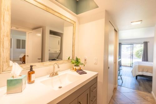a bathroom with a sink and a mirror at Cozy Sedona Retreat - Pool, Spa, Pickleball in Sedona