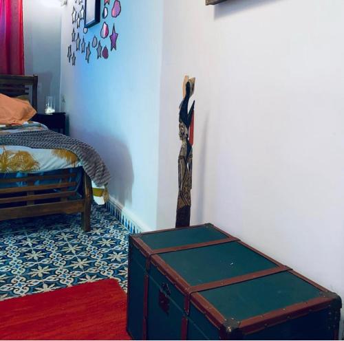 Postel nebo postele na pokoji v ubytování dar l’artiste