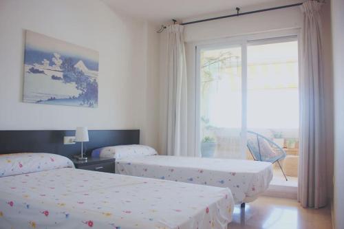 Oasis Apartment 100 meters from Beach with Private Parking