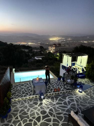Πισίνα στο ή κοντά στο Villaluna Sayoufa