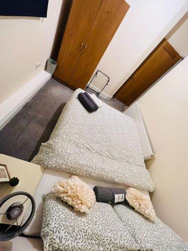 a room with two rugs on the floor of a room at Dormitorio Doble D08 in Dublin