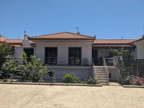 Corinthian Family Home