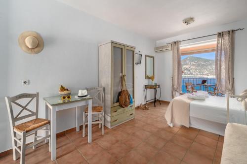 Ένα ή περισσότερα κρεβάτια σε δωμάτιο στο Niovi Seaview Apartments
