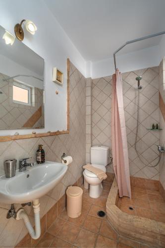 Ένα μπάνιο στο Niovi Seaview Apartments