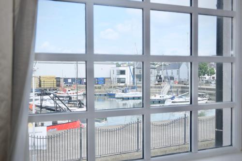 a view of a marina from a window at The Lough & Quay Accommodation in Warrenpoint