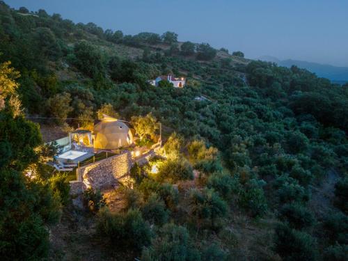 an aerial view of a yurt on a hill at Gogna luxury domes in Gonia