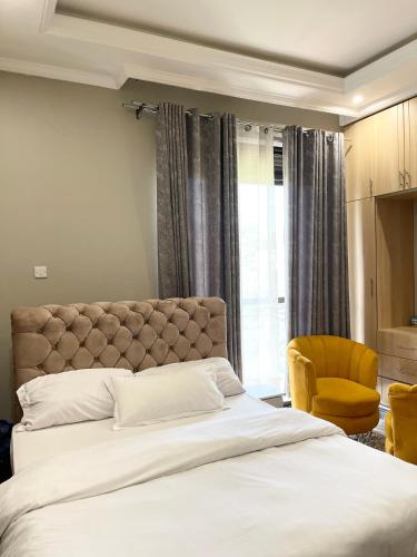 Ένα ή περισσότερα κρεβάτια σε δωμάτιο στο Home luxury apartments