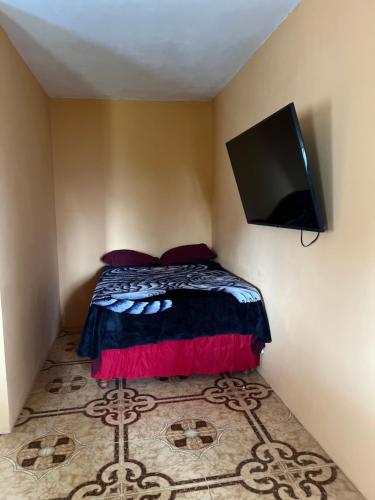 Ein Bett oder Betten in einem Zimmer der Unterkunft O- T on the rise