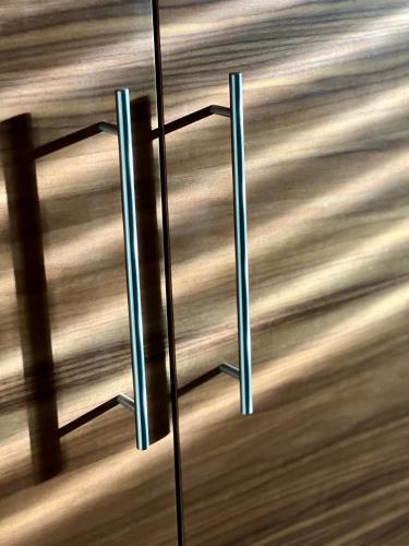 a close up of a table with metal poles at Hotel Gasthof Krönele in Lustenau