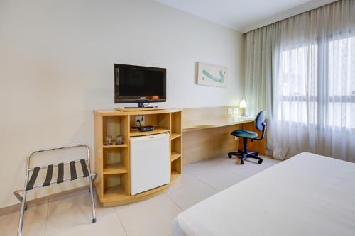 TV a/nebo společenská místnost v ubytování Comfort Franca