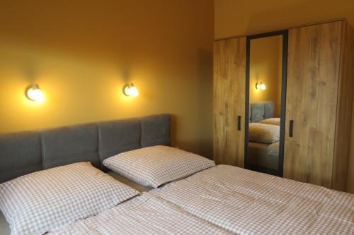 Postel nebo postele na pokoji v ubytování Weserberglandalm Haus 1