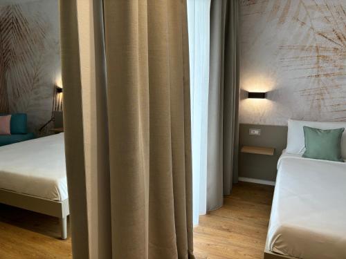Ein Bett oder Betten in einem Zimmer der Unterkunft Robely rooms