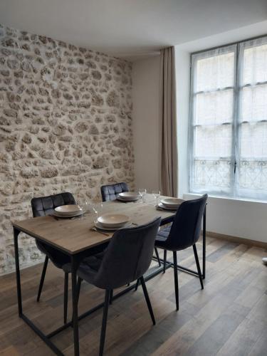 Ruang duduk di Appartements L'hirondelle