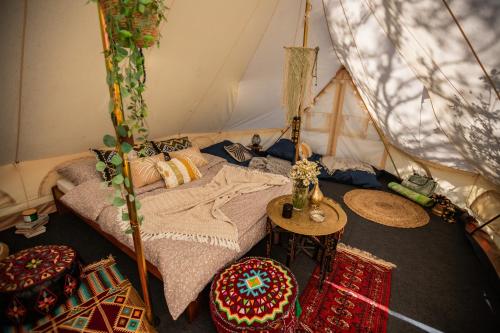 Ένα ή περισσότερα κρεβάτια σε δωμάτιο στο Glamping Hive