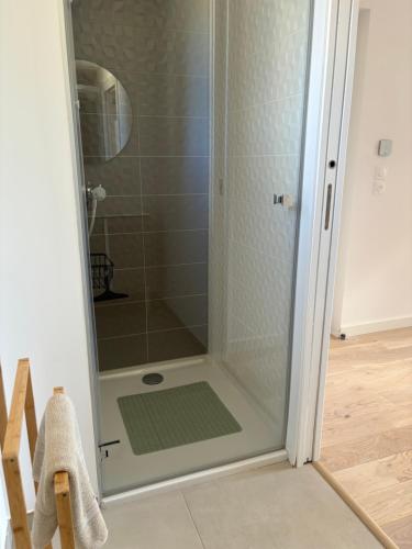a shower with a glass door in a bathroom at VillaGassin 403 - Luxury Villa with Private Pool near Saint-Tropez-Airco-parking in Saint-Tropez