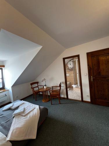 Cama o camas de una habitación en Apartmány BAROKO