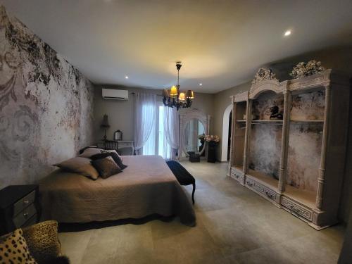 Ένα ή περισσότερα κρεβάτια σε δωμάτιο στο VILLA luxueuse privée avec piscine lagon