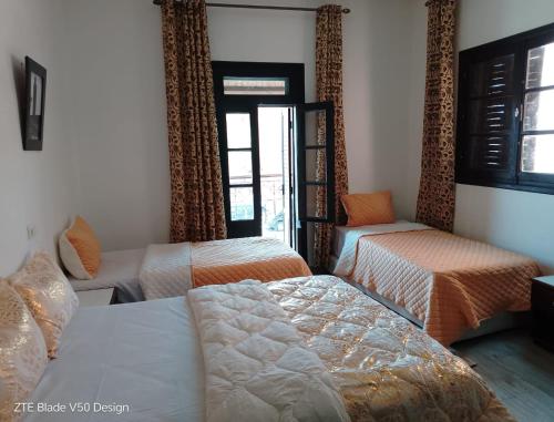 Postel nebo postele na pokoji v ubytování Medina-in auberge