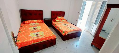 Ένα ή περισσότερα κρεβάτια σε δωμάτιο στο شاليه b1