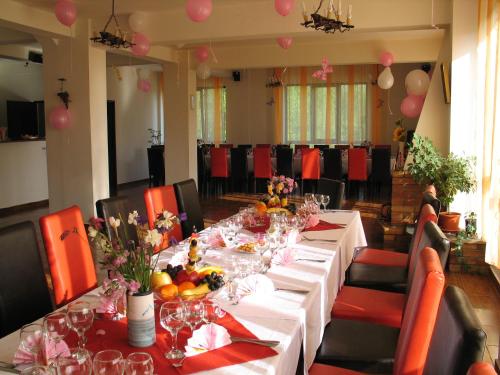 Restaurace v ubytování Pensiunea Cabana Veverita Valea Doftanei