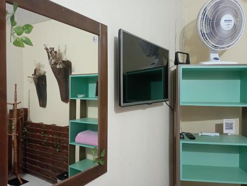 Televisyen dan/atau pusat hiburan di Hostel do Gui