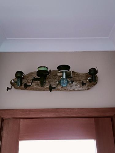 a chandelier on the wall above a door at Strandmarken in Island Beach