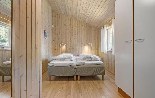 Ένα ή περισσότερα κρεβάτια σε δωμάτιο στο Nice Home In Højby With Wifi