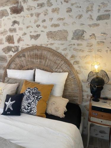 Ένα ή περισσότερα κρεβάτια σε δωμάτιο στο Atelier des Rêves