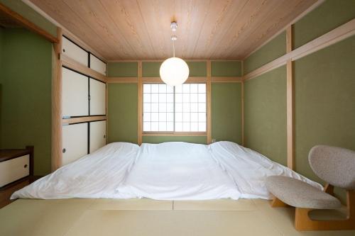 Postel nebo postele na pokoji v ubytování Max11名宿泊可能 一軒家を丸ごと貸切 BBQ可能 ファミリー歓迎 ANGO NASU I