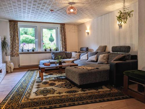 Posezení v ubytování Wohnung am Waldrand