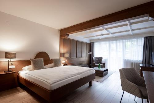Postel nebo postele na pokoji v ubytování Q! Hotel Maria Theresia