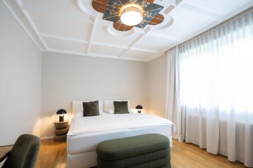 Postel nebo postele na pokoji v ubytování Q! Hotel Maria Theresia