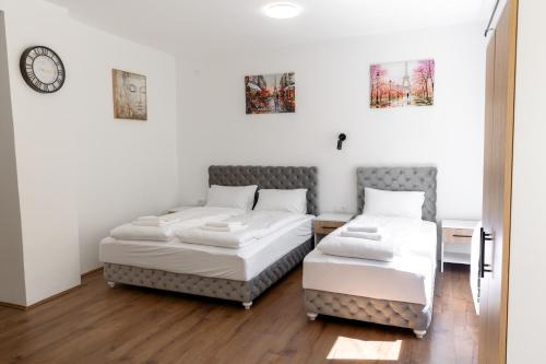 Ein Bett oder Betten in einem Zimmer der Unterkunft Luna Nera apartments