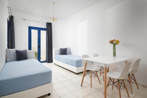 Postel nebo postele na pokoji v ubytování Artemis Apartments