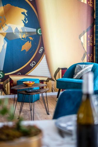 Posezení v ubytování Le 42-GregIMMO-Appart'Hôtel